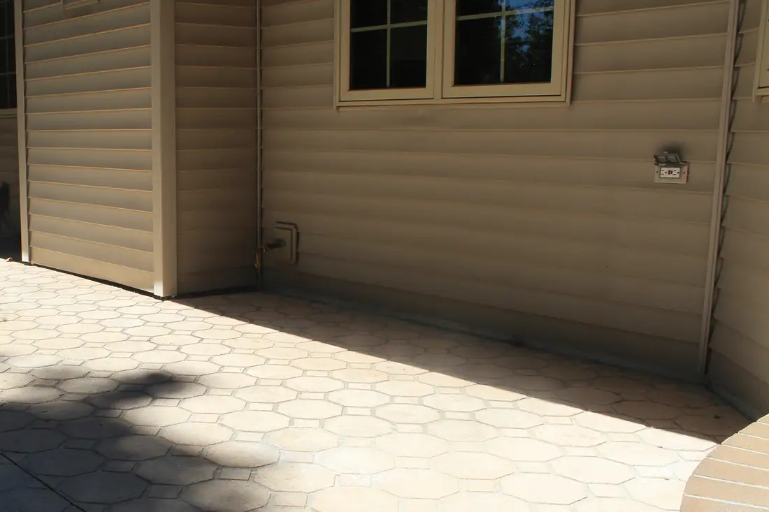 Before concrete repair in Berrien County, MI showing settled residential concrete before repair