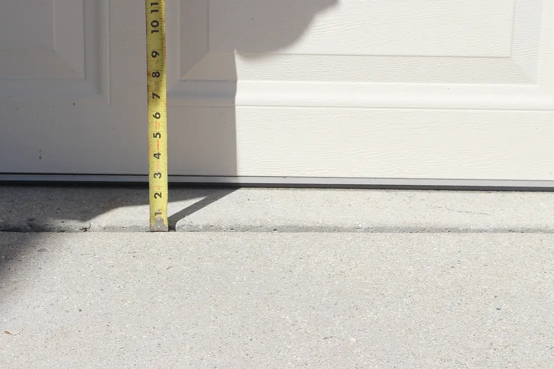 Before slab leveling in Berrien County, MI showing an uneven concrete slab before repair